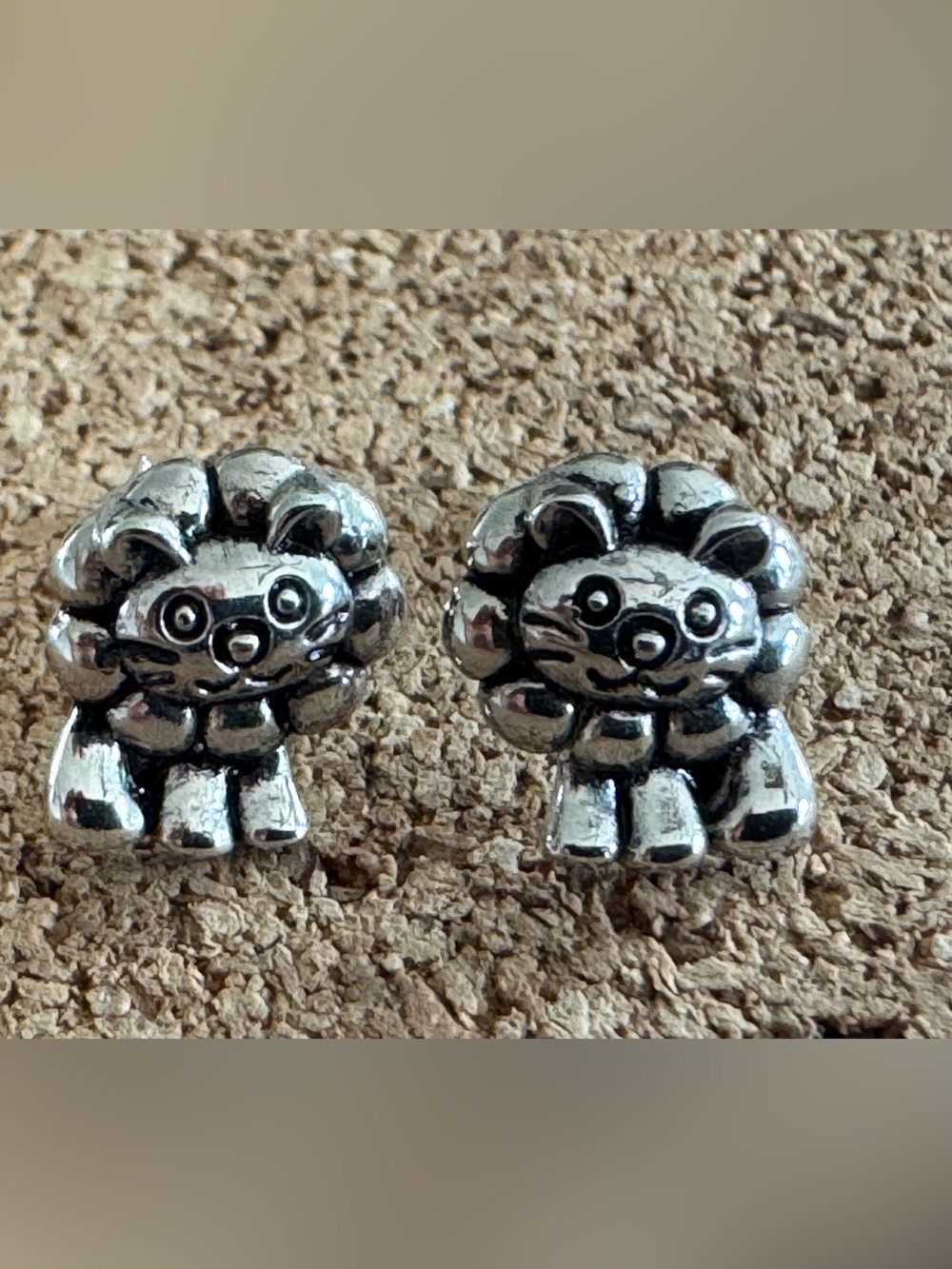 Lion stud earrings Sterling silver